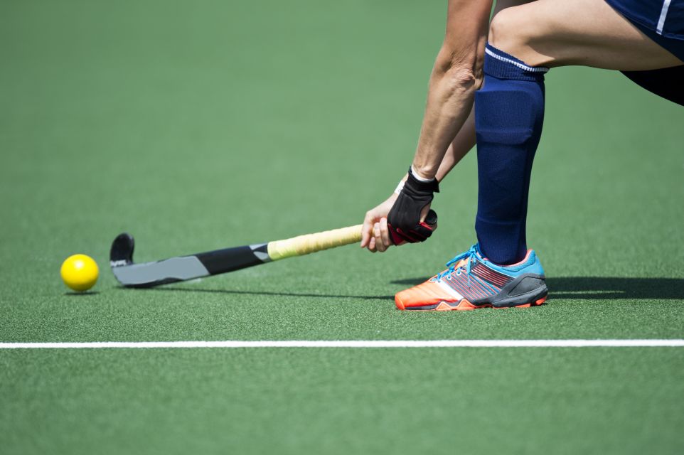 Hockeyer op hockeyveld
